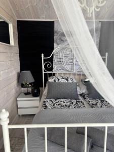 Domki LA MER USTKA z własnymi ogródkami- Balia z jacuzzi ,sauna ,rowery, klimatyzacja
