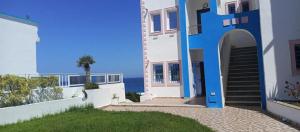 Dreamy Cartoon Seaside House