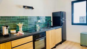 Appartements Fraternite Centre-ville,Clim,Wifi : photos des chambres