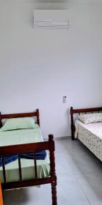 Casa familiar com 3 quartos e próximo a praia