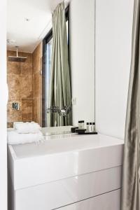 Appartements Azure Apartment : photos des chambres