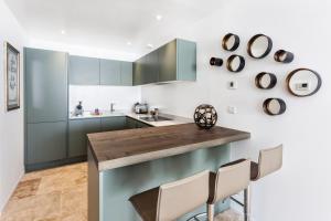 Appartements Azure Apartment : photos des chambres