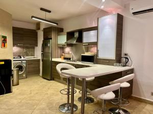 Exclusive 3BR Duplex With Private Rooftop in Ein Bay