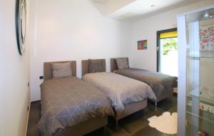 Maisons de vacances Villa De Standing : photos des chambres