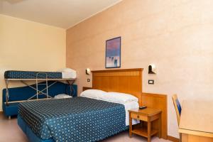 Quadruple Room with Balcony room in Hotel Verona