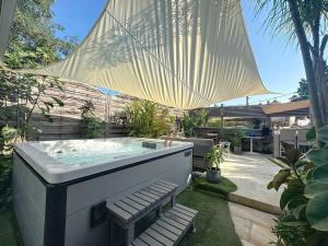 Maisons de vacances House La Palmeraie 4p-Garden-wifi-park-jacuzzi : photos des chambres