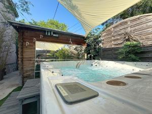 Maisons de vacances House La Palmeraie 4p-Garden-wifi-park-jacuzzi : photos des chambres