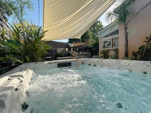 Maisons de vacances House La Palmeraie 4p-Garden-wifi-park-jacuzzi : photos des chambres