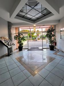 Appartements Charmant appartement vue piscine parc tropical Residence vacances Golfe-Juan : photos des chambres