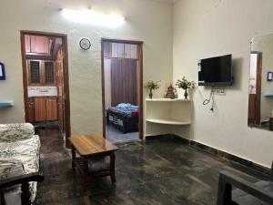 Natures Nest Homestay Tirupati close to Sri Padmavathi Ammavari Temple Tiruchanur close to toll road connectinghighways just behind Taj Tirupati and easy access to Garuda fly-over to Tirumala