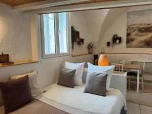Appartements Cote Cour - Studio voute by PRIM0 C0NCIERGERIE : photos des chambres
