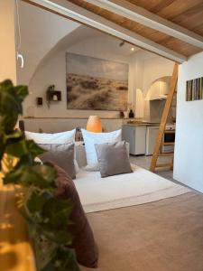 Appartements Cote Cour - Studio voute by PRIM0 C0NCIERGERIE : photos des chambres