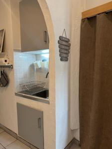 Appartements Cote Cour - Studio voute by PRIM0 C0NCIERGERIE : photos des chambres
