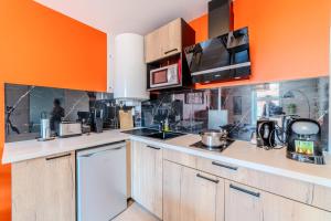 Appartements T2 Dahlia Roanne centre-ville - Parking & Clim : photos des chambres