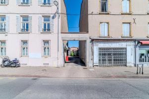 Appartements T2 Dahlia Roanne centre-ville - Parking & Clim : photos des chambres