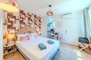 Appartements Tulipe Roanne centre-ville - Parking & Clim : photos des chambres