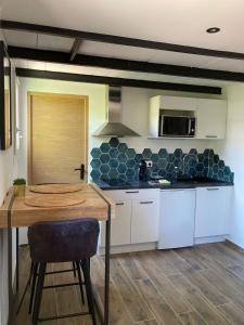 Maisons de vacances Les Elles du Moulin Avec Piscine : photos des chambres