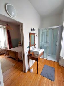Maisons d'hotes Les Suites Fisel : photos des chambres