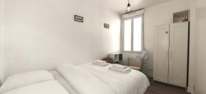 Appartements Proche Clignancourt (Metro 4) et Marche aux Puces : photos des chambres
