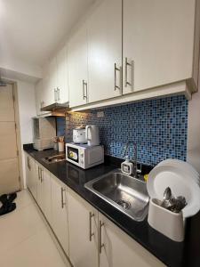 Sea Residences Affordable Staycation Near MOA - by Rose