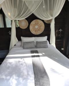 Lodges L-O2 et son Spa, cabane de verre et de bois : photos des chambres