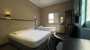 Suíte 13 • Praia das Pitangueiras