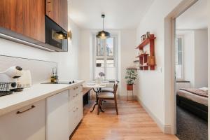 Appartements Le patio - Une cours interieur au coeur du vieux Dinan : photos des chambres