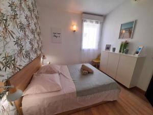 Maisons de vacances Maison cosy a Perols - proche plage & Parc Expo Arena - clim, garage : photos des chambres