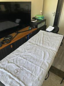 Sejours chez l'habitant Super chambre avec bureau : photos des chambres