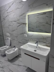 Gray & White Escape - Shkoder