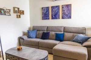 Cozy Condo with Panoramic Hillside Views from Rooftop Terrace and Short Walk to Beach