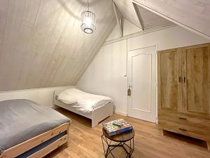 Maisons de vacances Maison avec jardin proche Paris : photos des chambres