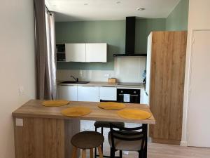 Appartements Studio independant climatise a Lyon 8 : photos des chambres
