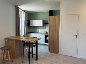 Appartements Studio independant climatise a Lyon 8 : photos des chambres