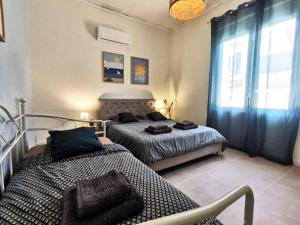 Appartements Le Cocon - Renove I Clim I Terrasse I WIFI I Hypercentre : photos des chambres