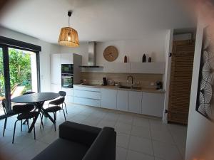 Duplex rose- Sérénité en Bord de Mer