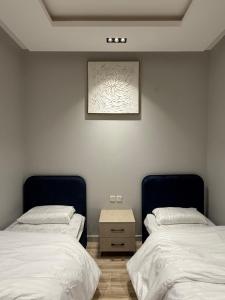 شقة بصالة وغرفتين نوم بدخول ذاتي