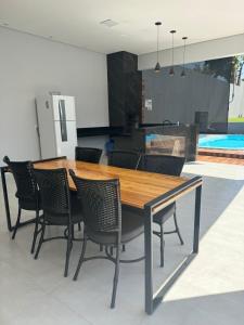 Casa com piscina, pet friendly e muito sossego