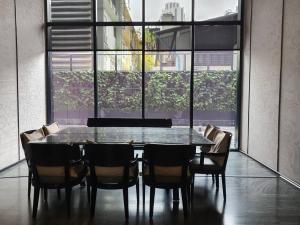 Soi Cowboy Terminal 21 one minute walk to BTS and MRT Coworking meeting room and desk and office chair