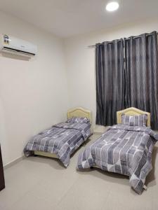 شقة غرفتين وصالة عوقد Two-Bedroom Apartment in Awqad