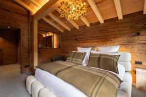 Chalets Forest Lodge, a luxury chalet with sauna and jacuzzi : photos des chambres