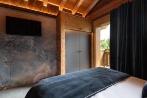 Chalets Forest Lodge, a luxury chalet with sauna and jacuzzi : photos des chambres