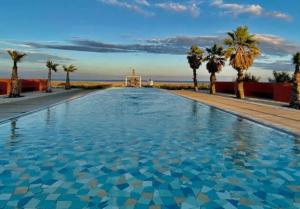 Maison de plage avec grande terrasse privée