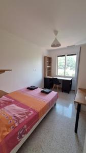 Appartements haut de Villa Fumseck climatise : photos des chambres