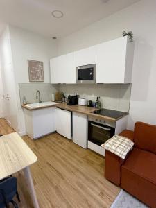 Appartements Charming 2-room, River Park : photos des chambres