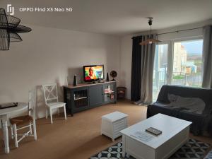 Appartements Entre terre et mer : photos des chambres