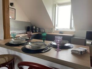 Appartements Le trait de cote vue mer commerces et plage a pied : photos des chambres