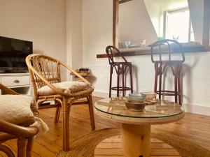 Appartements Le trait de cote vue mer commerces et plage a pied : photos des chambres