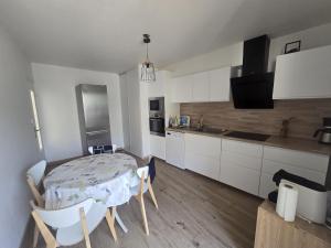 Appartements luxueux appart moderne et spacieux, parking plage : photos des chambres