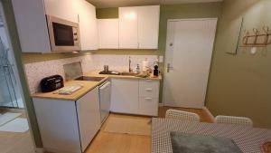 Plein centre à 3 mn à pied de la plage